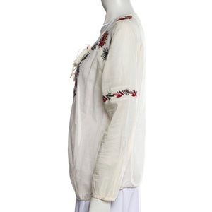 Tory Burch Blouse
Neutral
Long Sleeve with Scoop Neck
Sash-Tie Closure at Front